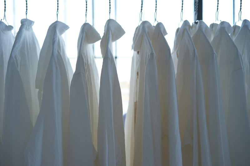 Sample photo: white shirts hanging in a row